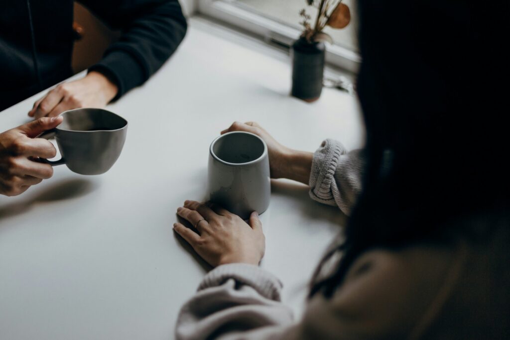 two people having coffee or tea